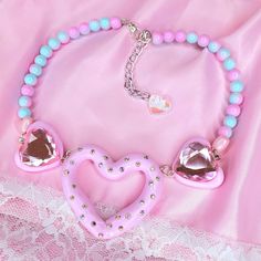 Was £38 ~ Now £30  The Polly Pocket inspired necklace featuring 3 clay heart charms embellished with iridescent crystals and pink crystal gems ~ on an ombre pink and blue beaded necklace  Length 34cm, Extender 6cm Main hollow heart charm size 6 x 5.5cm Hand-made with love in the UK Polymer Clay Kawaii Necklaces, Baby Cakes Kawaii Cottage Core Necklaces, Yami Kawaii Necklaces, Polly Pocket Necklace, Pink Heart Beads Pendant Jewelry, Pink Heart Pendant Necklace For Jewelry Making, Pink Heart Charm Necklace For Party, Pink Round Beads Kawaii Jewelry, Pink Heart Charm Necklaces For Jewelry Making