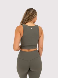 The ribbed crop top is the perfect top to hit your workouts in. The built-in sports bra has removable pads that provides support and style! Cropped Length Built-In Sports Bra Removable Padding U-Neck/Slightly Squared Neckline Squared Neckline, Ribbed Crop Top, Ribbed Leggings, U Neck, Ribbed Tank Tops, Cropped Sweater, High Waisted Leggings, Long Sleeve Crop Top, Quarter Zip