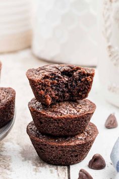 chocolate muffins stacked on top of each other