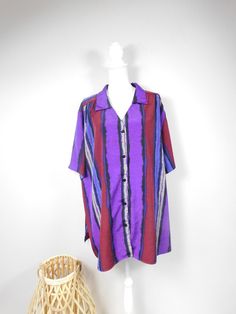 "Vintage 80s A Personal Touch Multicolor Striped Print Purple Button Down Collared Short Sleeve Top Blouse Shirt Sz 4X Plus Size This top is in excellent condition with no odors,or staining.  No sz tag. Kept in smoke free environment. This top measures:  Bust: 60\" Waist 62\" Hips: 64\" Top to bottom: 33\" (Measurements are taken across item laying flat and are then doubled.) Thanks for looking! Domestic Shipping: First Class (2-5 days)  International Shipping: First Class (based on weight). I s Vintage Retro Clothing, Mom Pants, Retro Clothing, Blouse Shirt, Blazer Buttons, Button Down Collar, Retro Outfits, Short Sleeve Top, Summer Sale