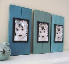 three frames are hanging on the wall above a shelf with a teal vase and two photos