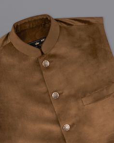 Everything feels good when you wear the best outfit. Boost your confidence and impress everyone around you by donning this fantastic solid brown Nehru jacket from French Crown. Peak lapels, double-breasted closure, and two flap pockets are some of its outstanding features. The fabric feels smooth on the skin. Layer it over a light-coloured shirt, a matching tie, and oxford shoes and you are good to go. In addition to being constructed from Imported Superior Fabrics, French crown Nehru jackets ar Brown Outerwear With Stand Collar And Buttons, Brown Stand Collar Blazer With Button Closure, Brown Blazer With Button Closure And Stand Collar, Brown Stand Collar Blazer With Buttons, Brown Blazer With Stand Collar And Buttons, Brown Single Breasted Blazer With Stand Collar, Brown Stand Collar Blazer For Winter, Brown Double-breasted Blazer With Buttons, Brown Winter Blazer With Stand Collar