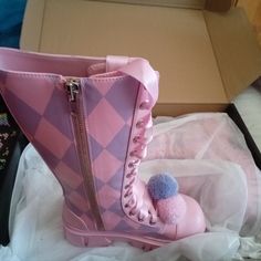 I Have Here A Brand New Pair Of Knee High Boots Never Worn From Dollskill. They Are Size 8 And Pink/Purple In Color. They Have A Side Zip Closure. I Only Tried Them On Once And They Are To Small For My Calfs Unfortunately. These Would Go Great With A Clown Costume For Halloween Or Anything Really :). Thanks For Looking :). Purple Round Toe Platform Boots For Winter, Purple High-top Platform Boots, Pink Flat Heel Boots For Party, Trendy Purple Boots With Round Toe, Trendy Purple Round Toe Boots, Purple Platform Boots With Round Toe, Cute Pink Leather Boots, Trendy Purple Lace-up Boots, Cute Pink Synthetic Boots