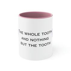 a white and pink coffee mug with the words, the whole tooth and nothing but the tooth