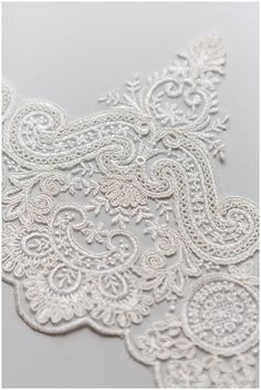 white lace with intricate designs on it