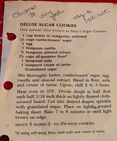 a recipe for delune sugar cookies on a table