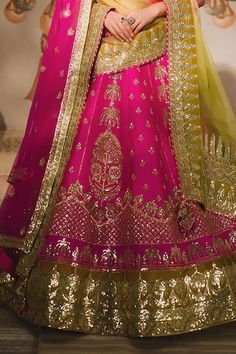 Rani pink lehenga featuring chand phool, sehra, moti chala and cutdana embroidery all over. Paired with a plunge neck embroidered blouse, a co-ordinating dupatta, a contrast dupatta and a separate cancan skirt. - Aza Fashions Pink Tilla Dupatta, Festive Pink Tilla Dupatta, Pink Sharara With Tilla In Traditional Drape, Pink Tilla Dupatta For Diwali, Pink Sharara With Tilla And Traditional Drape, Pink Tilla Choli For Festive Occasions, Pink Sharara With Tilla Embroidery, Pink Tilla Sets For Diwali, Diwali Pink Tilla Sets