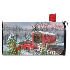 a mailbox with a painting of a red truck and christmas tree in the snow