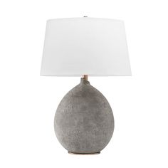 a gray table lamp with a white shade