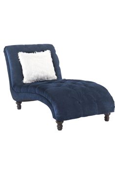 a blue chaise lounge chair with a white pillow on the top and bottom part of it