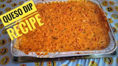 a casserole dish with cheese on it and a yellow sign reading queso dip recipe