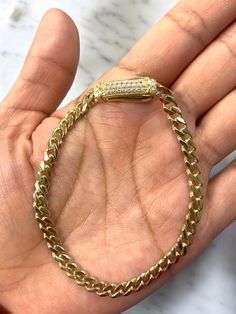 ● 14k Solid Gold Monaco Link Chain With CZ Lock Womens Ladies Bracelet 5mm 14 karat Real Gold 7.5" ●Metal : 14K Yellow Gold ●Purity : 14k with authenticity stamp ●Thickness: 5mm ●Length: 7.5" ●Weight: Approx 7.3 ●Condition : Brand New With Tags ●Clasp : Box CZ Clasp ●Complimentary Premium Jewelry box included ●Free Shipping within U.S.A Be sure to hit "favorite" on the right so it remains on your favorites list and/ or add to your wishlist(s). BUY GENUINE GOLD JEWELRY WITH 100% CONFIDENCE Yellow Gold Cuban Link Diamond Bracelet Gift, Yellow Gold Cuban Link Tennis Bracelet With Cubic Zirconia, Cuban Link Yellow Gold Tennis Bracelet With Cubic Zirconia, Yellow Gold Cuban Link Diamond Bracelet, Gold Diamond Cuban Link Bracelet With Vvs Clarity, Gold Diamond Bracelet With Cuban Link For Formal Occasions, Formal Gold Diamond Bracelet With Cuban Link, Yellow Gold Cuban Link Bracelet, Yellow Gold Cuban Link Tennis Bracelet As Gift