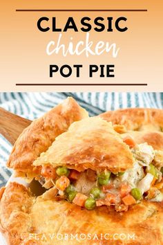 a chicken pot pie is cut in half on a plate