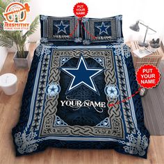 a bed with a blue star on it and the words your name printed on it