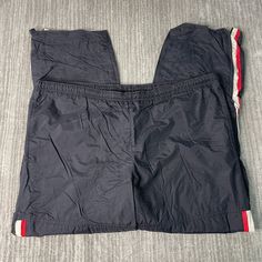 Vintage 2000s Nike Swoosh Check Loose Fit Sportswear Windbreaker Y2K Aesthetic Streetwear Black Track Pants Extra Large Waist Mens Condition:  Excellent Used Condition  = No Flaws Measurements: Please see photos above for all measurements IF YOU BUY TWO OR MORE ITEMS USE THE CODE BUNDLE @ CHECK TO SAVE 20% WE SHIP WITHIN 24 HOURS AFTER PURCHASE! Please be aware that we do not offer free returns!! The Buyer is responsible for the cost of the return label. Follow us on TikTok & Instagram @findsnostalgic and tag us in your finds 90s Style Black Sports Pants, Sportswear Bottoms With Pockets For Sports Events, Black Casual Pants For Sports Events, Casual Sports Bottoms With Pockets, Nylon Sportswear Bottoms For Sports Events, Sporty Parachute Pants With Moisture-wicking For Sports, Casual Bottoms With Pockets For Sports Events, Sporty Moisture-wicking Parachute Pants For Sports, 90s Style Sports Pants With Pockets