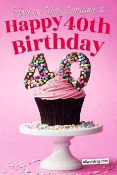 a birthday card with a cupcake and the number forty on it, in front of a pink background