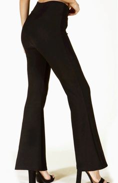 These Buttery Soft Flare Pull On Pants offer both style and comfort. Made with a peach skin brushed poly fabric, they have a soft and smooth feel. The wide elastic high waist band adds a flattering touch while the fitted style and wide open leg enhance your figure. With 92% poly and 8% spandex, they provide the perfect amount of stretch for all-day wear. Chic Wide-leg Yoga Pants, Versatile Full-length Elastane Yoga Pants, Solid Stretch Straight Dress Pants, High Stretch Long Pants For Work, Comfort Stretch Solid Color Straight Yoga Pants, Elastane Straight Pants For Yoga, Chic Fitted Full-length Sweatpants, Elastane Straight Leg Yoga Pants, Chic Full-length Comfort Stretch Pants