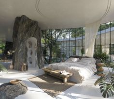 a bedroom with large rocks and plants on the floor