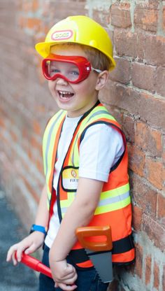 Build your heart out! This construction set has you prepped and ready for the job and looking the part in this complete 7 piece dress-up-and-play set. This set includes an orange vest with reflective stripes, a hard hat with decal, play plastic a hammer, a play plastic mini saw, a play plastic screwdriver safety goggles, and a name tag so everyone at the job site knows who you are. All our Great Pretenders Career Costumes are packaged in a reusable blue garment bag for easy storage. 7 Piece Set: Construction Worker Costume, Construction Vest, Career Costumes, School Dress, Safety Goggles, School Dresses, Construction Worker, Diaper Bag Backpack, Garment Bag