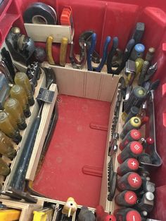 a red toolbox filled with lots of tools