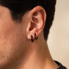 Edgy yet minimalist, our sleek Black Hoops will elevate any outfit. Whether dressed up for a special occasion or sporting a casual everyday look, these versatile earrings are a must-have in his collection. Grab all three sizes to create a set and you have the perfect gift for him! SKU: RR-ER422, RR-ER423, RR-ER424; BB-EB040 Product Details Material: Stainless Steel ∙ Hypoallergenic ∙ Waterproof ∙ Tarnish Free Finish: Black IP Featured Styles Featured Styles & Dimensions (All Sold as Pairs): Styl Black Hoop Earrings, Initial Tag Necklace, Fingerprint Necklace, Sideways Initial Necklace, Black Hoops Earrings, Dainty Initial Necklace, Mens Earrings Hoop, Double Hoop Earrings, Diamond Huggies