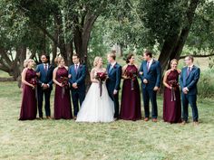 a bride and groom with their bridal party