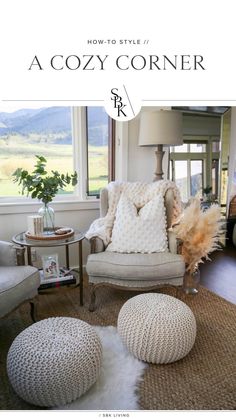 a living room filled with furniture and pillows on top of a rug next to a window