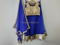 This is a made to order Lehenga Choli dupatta.  skirt semi stitched with flair 3 mtrs dupatta ready  custom stitched is fully stitched set made to your size, flair 4-5 mtrs I make it exclusively for my customers by using designer fabrics. I will only start making it after you confirm your required size details. Handling time: Don't worry, just tell me, I will process it accordingly and deliver on or before a delivery date you mention. Size: This is custom made as per your size. Post your order I will send you a measuremnts reference sheet using which you can provide details required to make your outfit. Fabric and work: The skirt or Lehenga is made with blue color soft net fabric with very good quality lining and sequines lace border. Blouse is made with golden sequins fabric. Dupatta is i Party Wear Lehenga Choli, Indian Party, Indian Party Wear, Party Kleidung, Party Wear Lehenga, Royal Blue Color, Sequin Fabric, Lehenga Choli, Dress For Women