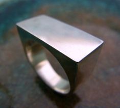 The most perfect statement male ring made of sterling silver rectangle. Simple lines, modern and classic at the same time. shiny and impressive. 23/12 mm on top. Another signet ring you can find here: https://www.etsy.com/il-en/listing/188742177/signet-ring-man-silver-ring-men-signet?ref=sr_gallery_5&ga_search_query=signet+ring+men&ga_page=2&ga_search_type=all&ga_view_type=gallery Male Ring, Silver Mens Ring, Gold Jewelry Outfits, Harry Potter Jewelry, Man Ring, Signet Ring Men, Silver Necklaces Women, Sterling Silver Mens Rings, Jewelry Catalog