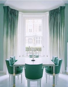 an image of a table and chairs in front of a window