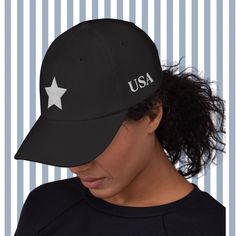 "This USA hat is perfect for showing your American pride and spirit at the beach, gym, a hike, or just to cover up a bad hair day. Our USA baseball cap features a white embroidered star on the front and white embroidered USA on the left side. We love the minimalist and trendy design for all your summer activities. This baseball cap features a low profile with an adjustable strap and curved visor. * 100% chino cotton twill * Green Camo color is 35% chino cotton twill, 65% polyester * Unstructured America Hat, Usa Baseball, Fall Hats, Embroidered Hat, Hat Summer, Embroidered Baseball Caps, Camo Colors, Women's Beanie, Womens Baseball Cap