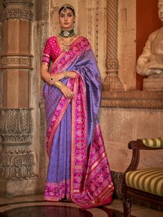 This stunning saree features a beautiful zari patola print work on a luxurious purple silk fabric, making it the perfect choice for weddings, festivals, and other special occasions.
The saree comes with a matching pink silk blouse with patola print work, adding a pop of color to the overall look. The 5.50 meters saree and unstitched blouse material allow for customization to ensure the perfect fit for any body type.
This saree includes its intricate patola print work, which adds a traditional to Festive Purple Tussar Silk Pre-draped Saree, Bollywood Style Purple Art Silk Pre-draped Saree, Purple Art Silk Pre-draped Saree For Navratri, Purple Dola Silk Pre-draped Saree, Pink Bollywood Pre-draped Saree With Meenakari, Traditional Purple Pre-draped Saree For Puja, Traditional Purple Pre-draped Saree For Navratri, Traditional Purple Pre-draped Saree, Purple Banarasi Silk Sets With Zari Work