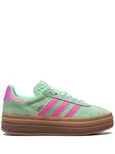 mint green/bubblegum pink calf leather signature 3-Stripes logo round toe logo-print tongue front lace-up fastening contrasting heel counter branded insole platform sole gum-rubber sole These styles are supplied by a premium sneaker marketplace. Stocking only the most sought-after footwear, they source and curate some of the most hard to find sneakers from around the world. Green And Pink Sambas, Pink And Green Adidas, Sneaker Wishlist, Adidas Gazelle Outfit, Adidas Gazelle Bold, Gazelle Bold, Bold Shoes, Preppy Shoes, Pretty Shoes Sneakers