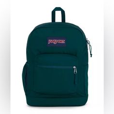 The Jansport Cross Town Plus Backpack Is The Perfect Companion For Students Heading Back To School. Designed With Functionality And Comfort In Mind, This Stylish Dark Green Backpack Offers Ample Space And A Variety Of Features To Keep You Organized And Ready For The Day. Key Features: Product Dimensions: 17” L X 12.5” W X 6” H Lightweight: Weighing Only 0.7 Lbs, It’s Easy To Carry Around All Day. Laptop Sleeve: Padded 15-Inch Laptop Sleeve Keeps Your Tech Secure. Front Utility Pocket: Includes A Sporty Green Bag With Functional Pockets, Sporty Back To School Bags With Functional Pockets, Green Standard Backpack For Sports, Green Sporty Rectangular Backpack, Sporty Green Rectangular Backpack, Sporty School Bag With Functional Pockets, Dark Green Backpack, Highschool Essentials, Jansport Superbreak Backpack