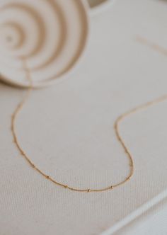 Satellite Chain Dainty Beaded Chain Charm Necklace For Everyday, Dainty Station Necklace With Delicate Chain As Gift, Dainty Station Necklace With Delicate Chain, Everyday 14k Gold-filled Necklaces With Tiny Beads, Everyday 14k Gold Filled Tiny Beads Necklace, Everyday 14k Gold-filled Necklace With Tiny Beads, Everyday 14k Gold Filled Necklace With Tiny Beads, Minimalist Station Necklace With Satellite Chain As A Gift, Minimalist Station Necklace With Satellite Chain For Gift