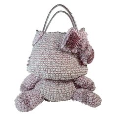 This unique ribbon and plastic woven bag is in the shape of Hello Kitty. The bag features pink rhinestone embellishments and a silver detachable chain strap as well as plastic handles. It comes with a dust bag. Measurements in Inches: Length: 8 Width: 7 Height: 9 Bow: 5 Handles: 13 Chain: 17.5 Plastic Woven Bag, 2000s Baddie, Hello Kitty Purse, Handbags Patterns, Kawaii Bag, Easy Patterns, Kitty Plush, Kitty Drawing, Pink Hello Kitty