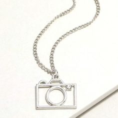 Silver Camera Necklace For Sale! This Necklace Is So Cute! It Features A Silver Camera Charm With A Little Crystal In Place, For The Flash! It Has An Adjustable Silver Chain. It Is New, Never Been Worn, And It’s From My Boutique! Such A Cute Necklace To Add To Your Jewelry Collection! Camera Necklace, Boho Pendant Necklace, Sterling Silver Heart Necklace, Bubble Necklaces, Star Pendant Necklace, Silver Heart Necklace, Silver Accessories, Cute Necklace, Yellow Gold Chain