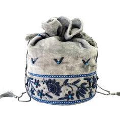 Designer gray velvet potli bag embroidered with blue flowers, zardozi purse. Beaded Pouch Bag, Metallic Flowers, Costume Closet, Velvet Handbag, Adventure Bags, Beaded Pouch, Handbag Boutique, Potli Bag, Wrist Bag