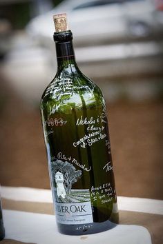 a bottle of wine sitting on top of a table