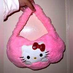 Super Cute Hello Kitty Pink Fuzzy Handbag New Never Used Perfect For Everyday Wear Can Be Used By Any Age Quality Cute Bag Same Or Next Day Shipping Trendy Hello Kitty Pouch Bag, Trendy Hello Kitty Shoulder Bag, Pink Hello Kitty Print Fun Bag, Cute Hello Kitty Print Shoulder Bag, Trendy Pink Hello Kitty Shoulder Bag, Fuzzy Handbag, Tan Leather Handbags, Metallic Handbags, Yellow Purses