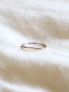 Classic and subtle Whisper ring. The ring is so delicate, yet study for everyday basis. Pair well with Luxor and Jane rings. Everyday Tiny Stackable Rings In 14k Gold, Delicate Everyday Stackable 14k Gold Rings, Everyday Delicate 14k Gold Stackable Rings, Delicate Tiny 14k Gold Midi Rings, Dainty Recycled Gold Rings With Simple Design, Everyday Hammered Recycled Gold Rings, Everyday Tiny 14k Gold Rings, Minimalist 14k Gold Filled Promise Ring, Delicate Tiny Stackable 14k Gold Rings