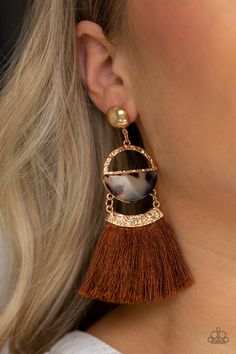 A shimmery gold stud links with a hammered gold frame featuring a tortoiseshell print acrylic accent. Featuring a hammered gold fitting, a shiny brown threaded tassel attaches to the bottom of the retro lure for a flirtatious finish. Earring attaches to a standard post fitting. Color may vary. Sold as one pair of post earrings. Bedazzled Jewelry, Paparazzi Accessories Jewelry, Brown Earrings, Tassel Jewelry, Hammered Gold, Paparazzi Accessories, Paparazzi Jewelry, Gold Stud, Acrylic Earrings