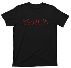 a black t - shirt with the word regum written in red ink on it