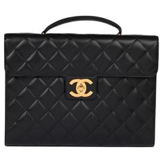 Chanel Black Quilted Caviar Leather Vintage Jumbo XL Classic Briefcase Product Details Xupes Ref: HB5623 Brand: Chanel Model: Jumbo XL Classic Briefcase Type: Top Handle Serial Number: 3766290 Age: 1996 Accompanied By: Chanel Dust Bag, Authenticity Card Colour: Black Hardware: Gold (24k Plated) Material(s): Caviar Leather Specification Height: 29cm Width: 37cm Depth: 7cm Handle Drop: 5cm Interior: Black Leather Closure: Turn Lock Country of Origin: France Authenticity Details: Serial Sticker, Au Luxury Classic Rectangular Box Bag, Luxury Chic Rectangular Box Bag, Chanel Top Handle Bag, Chanel Top Handle, Chanel Top, Vintage Chanel Bag, Chanel Brand, Louis Vuitton Pink, Chanel Model