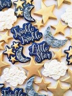 some cookies that are decorated with stars and moon