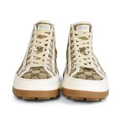 Gucci high-top sneakers in beige 'GG' monogram canvas with a white and gum thick rubber sole. Features white canvas trim, logo patch on the tongue, and white flat laces. Includes dust bag and extra white flat laces. Brand = Gucci Size = Women's 36.5 EU Condition = 9/10, Excellent, very light scuffs to toe rubber Material = Canvas/Rubber SKU = 21945-4 Gucci High Top Sneakers, Gucci High Tops, Top Sneakers Women, Gg Monogram, White Flat, White Flats, Rubber Material, Fendi Bags, White Canvas