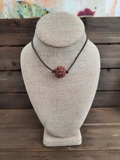 This leather necklace  features a single 5 Mukhi Rudraksha bead and also has a 2" extender.  The attached Kiki tag will detail all the information on this piece  Your purchase will also include a nice burlap gift bag so no need to request gift wrapping. Thanks for stopping by! 5 Mukhi Rudraksha, Rudraksha Jewelry, Burlap Gift Bags, Rudraksha Beads, Franklin Tn, Meditation Yoga, Spiritual Jewelry, Leather Necklace, Gift For Him