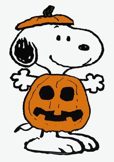 a charlie the peanuts character holding a jack - o'- lantern