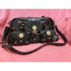 ~ Black Simulated Leather With Gold Accents London Fog Purse ~ Brand New, Original Price Tag Still Attached ~ 16.5" 8" 5.5" ~ The Inside Has A Small Zipper Compartment On One Side And Two Regular Compartments On The Other Side ~ Two Functional Pockets With Buckles On The Front ~ Zipper Closure And Buckle Latch ~ Shoulder Strap Is Removable ~ Originally $70, But Open To Reasonable Offers ~ Please Do Not Hesitate To Message Me If You Have Any Questions Or Would Like To See More Pictures! :) Designer Crossbody Satchel With Branded Hardware For Daily Use, Designer Crossbody Satchel For Daily Use, Daily Use Designer Satchel With Branded Hardware, Daily Use Rectangular Satchel With Branded Hardware, Black Handheld Satchel With Metal Hardware, Rectangular Satchel With Branded Hardware For Daily Use, Handheld Black Satchel With Metal Hardware, Rectangular Satchel For Daily Use With Branded Hardware, Black Rectangular Satchel With Metal Hardware