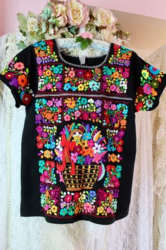 "Gorgeous artisanal embroidered floral blouse with vibrant floral colors at front and sleeves. Perfectly well made..such a unique piece to have and can be styled with almost anything such as denim, cowboy boots, boho style, and cute accessories..so much more. Great Quality No Stains, Rips, Holes or Fade Brand New Handmade with Love by Artistic Artisans in Mexico who create unique beauty pieces with so much passion, dedication and pure love into each item as seen on the pics..every detail is perf Traditional Multicolor Embroidered Top For Fiesta, Multicolor Bohemian Crew Neck Blouse, Fitted Multicolor Floral Embroidered Top, Bohemian Multicolor Crew Neck Blouse, Multicolor Floral Print Festival Blouse, Multicolor Bohemian Embroidered Top For Fiesta, Multicolor Bohemian Blouse With Crew Neck, Multicolor Embroidered Blouse For Fiesta Festivals, Multicolor Floral Embroidery Blouse For Fiesta